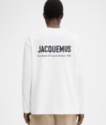 Long sleeve t-shirt with printed address and logo.
